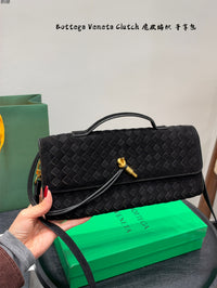 Andiamo Intrecciato Suede Clutch